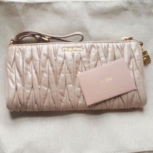 Sold:  Miu Miu Leather Clutch Bag